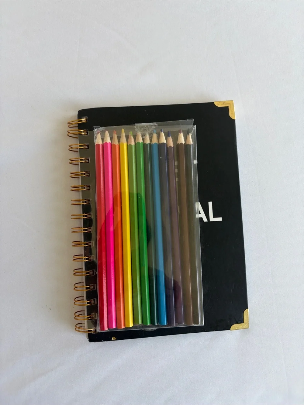 Bullet Journal Game Spiral Notebook in Black with Colored Pencils